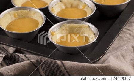 Egg tarts home production Egg tarts home production 124629307