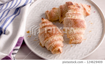 Small croissants Small croissants 124629409