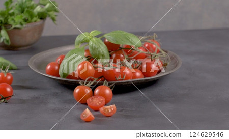 Small red cherry tomatoes 124629546
