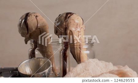 Chocolate ice cream in waffle cones Chocolate ice cream in waffle cones 124629555