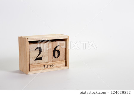 Wooden calendar June 26 on a white background Wooden calendar June 26 on a white background 124629832