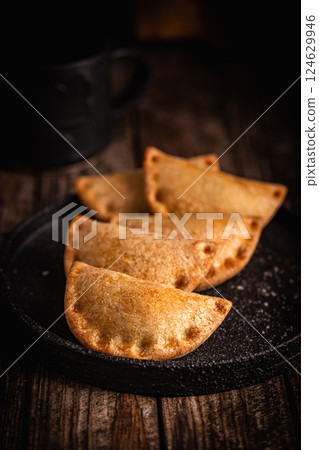 Traditional baked Spanish empanadas 124629946