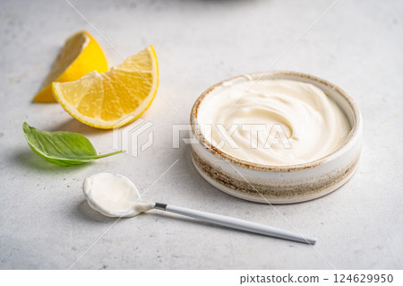 Bowl of tasty sour cream Bowl of tasty sour cream 124629950