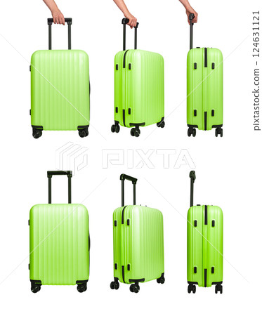 Luggage collection for travel. Green suitcase with telescopic handle and wheels, ready for a 124631121