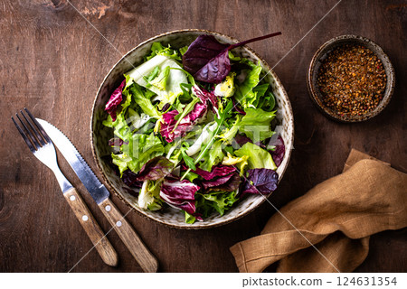 Bowl of fresh green salad mix 124631354