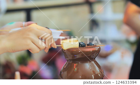 Fruit, berries prepared chocolate fountain. Wedding celebration. 124633394