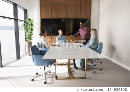 Engaged team participate briefing or training led by African boss Engaged team participate briefing or training led by African boss 124634198