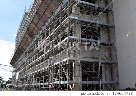Scaffolding installed at construction site 124634788
