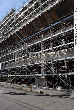 Scaffolding installed at construction site 124634790
