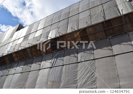 Scaffolding installed at construction site Scaffolding installed at construction site 124634791