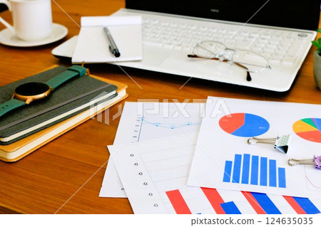 Desk work business image graph chart Desk work business image graph chart 124635035