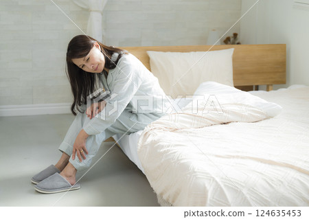 Senior woman in unwell bedroom 124635453