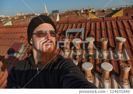 Selfie on a tiled rooftop 124635840