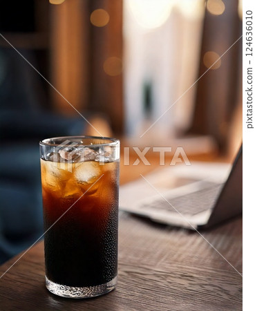 Computer and iced coffee 124636010