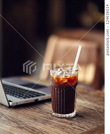 Computer and iced coffee Computer and iced coffee 124636014