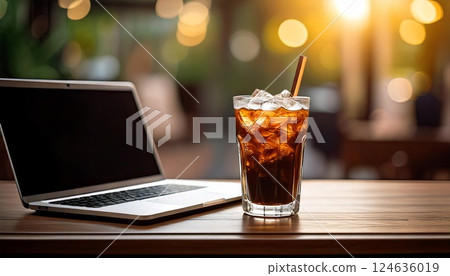 Computer and iced coffee Computer and iced coffee 124636019