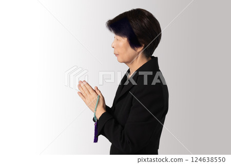 Mourning clothes, praying, funeral, image 124638550
