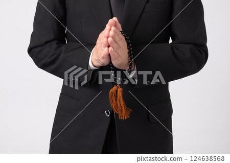 Mourning clothes, praying, funeral, image 124638568