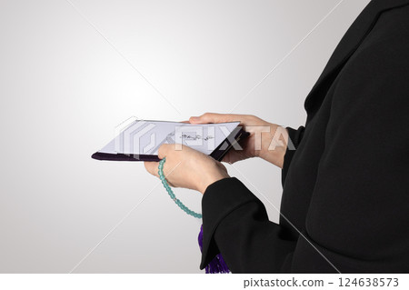 Mourning clothes, praying, funeral, image Mourning clothes, praying, funeral, image 124638573