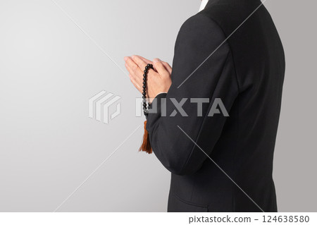 Mourning clothes, praying, funeral, image 124638580