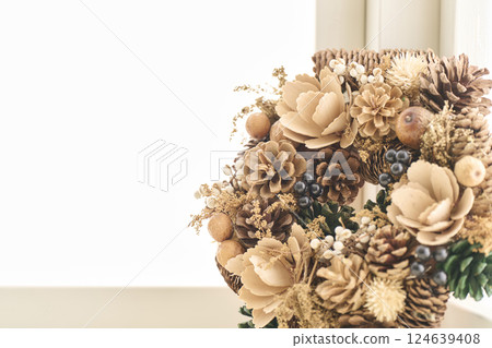 Christmas wreath decorated on a window sill Christmas image 124639408