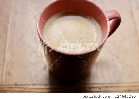 A mug full of cafe latte 124640280