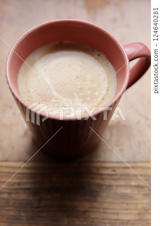 A mug full of cafe latte 124640281
