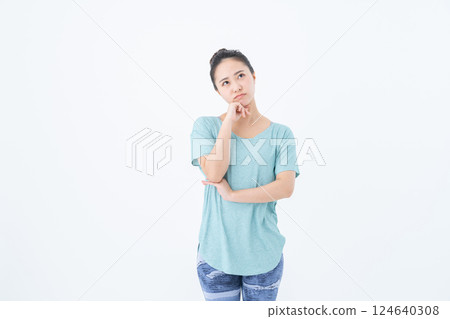 Young woman in yoga wear Young woman in yoga wear 124640308