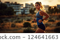 A young woman jogging through an urban at sunrise environment. Ai generated. 124641663