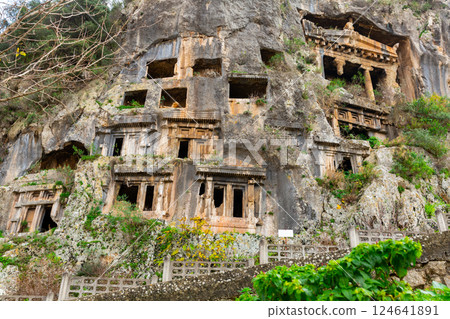 Antique rock burial chambers in Turkish village of Fethiye Antique rock burial chambers in Turkish village of Fethiye 124641891