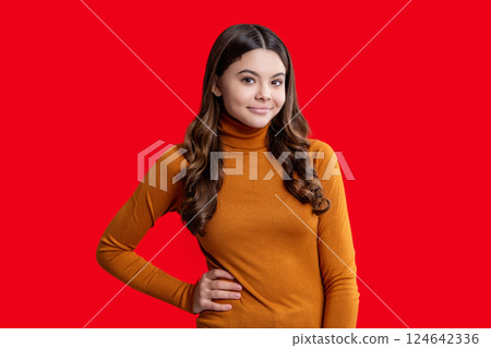 Portrait of girl has curly hair. Stylish girl in casual sweater. Teen girl wear casual style isolated red. Teen fashion girl portrait. Trendy stylish teen. Fashion style for teen. Refined simplicity 124642336