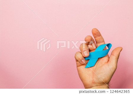 Promoting awareness for cancer through symbolic blue ribbon display Promoting awareness for cancer through symbolic blue ribbon display 124642365