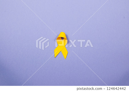 Symbol of hope and solidarity in cancer awareness and prevention efforts 124642442