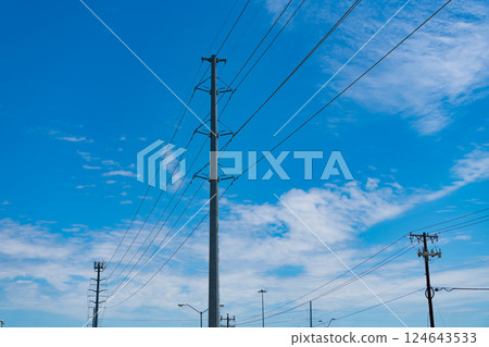 pylon producing energy. voltage transmission on electric tower. high voltage powerline. powerful substation. electricity provider. powering pylon utility. electricity power lines maintenance pylon producing energy. voltage transmission on electric tower. high voltage powerline. powerful substation. electricity provider. powering pylon utility. electricity power lines maintenance 124643533