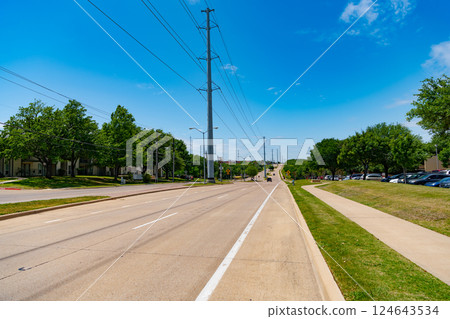 road way with no cars. empty road with destination in horizon. road way with power lines. travelling by road way road way with no cars. empty road with destination in horizon. road way with power lines. travelling by road way 124643534