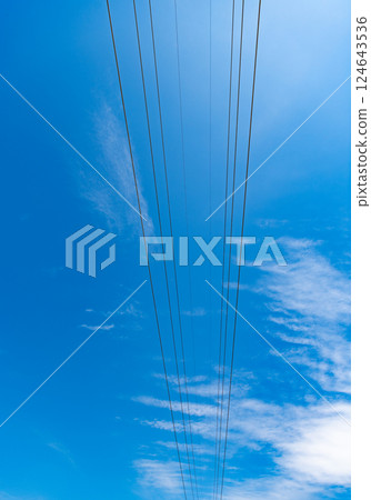 wire producing energy. voltage transmission on electric wire. high voltage powerline. powerful powerline. electricity provider at the sky. electricity power lines wire. wire producing energy. voltage transmission on electric wire. high voltage powerline. powerful powerline. electricity provider at the sky. electricity power lines wire. 124643536