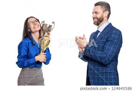 Business success. Two businesspeople on business successful meeting isolated on white. Successful business woman man in suit hold champion cup. Business reward and success. Express congrats 124643586
