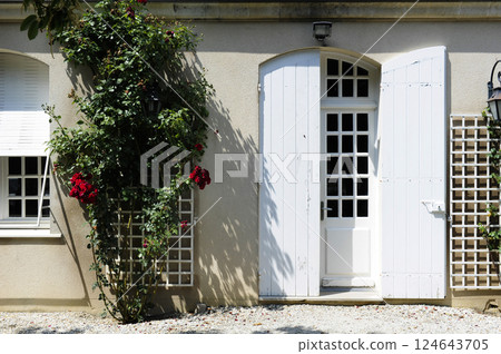 White window, red flower 124643705