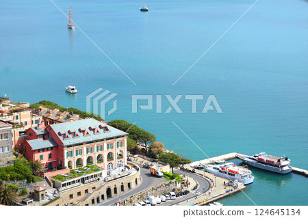 Yachts, boats in bay of Porto Venere, Liguria. Sea and tourism in Italy. Traditional buildings. Background for design. Yachts, boats in bay of Porto Venere, Liguria. Sea and tourism in Italy. Traditional buildings. Background for design. 124645134