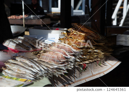 Stalls of fish for sale such as Omul fish which is a fish that can only be found in Lake Baikal at Listvyanka market. 124645361