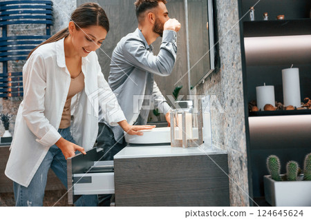 Indoors together. Woman and man is in the store of goods for the home 124645624