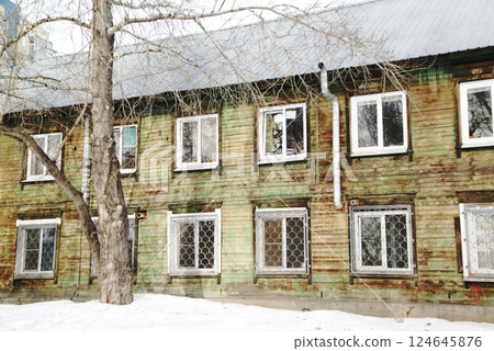 Old-style houses with distinctive windows can be found everywhere in Irkutsk city. Old-style houses with distinctive windows can be found everywhere in Irkutsk city. 124645876