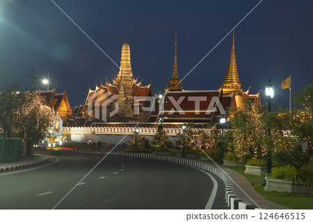 Beautiful lights decorate Wat Phra Kaew at sunset. This is a place of respect and tourism for Buddhists around the world. Located at Bangkok city in Thailand. 124646515