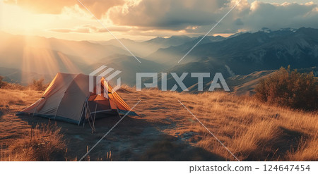 campsite with tent at nature, camping in mountains at sunset 124647454