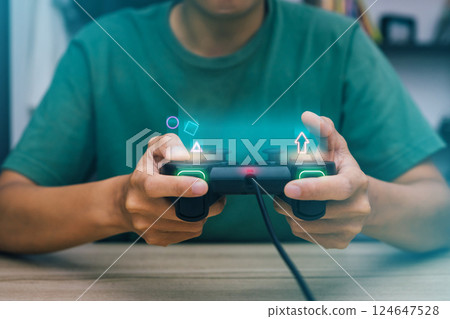 Close up hand playing game using joystick console a games gadget video games. Close up hand playing game using joystick console a games gadget video games. 124647528