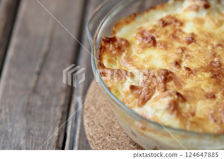 A golden brown gratin made in a heat-resistant glass dish A golden brown gratin made in a heat-resistant glass dish 124647885