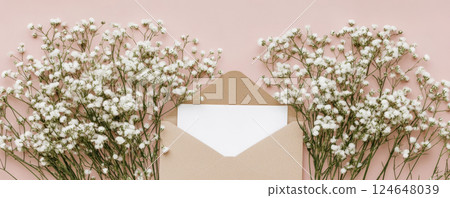 Elegant Floral Envelope with Blank Card on Stylish Background 124648039