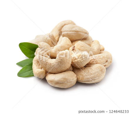Cashew nuts heap with leaves 124648233