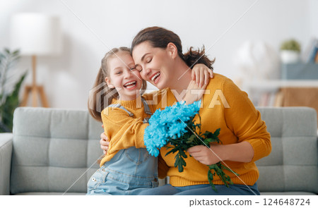 daughter and mom with flowers 124648724