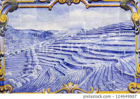 Blue azulejos with motifs from Douro Valley, train station of Pinhao, Portugal Blue azulejos with motifs from Douro Valley, train station of Pinhao, Portugal 124649987
